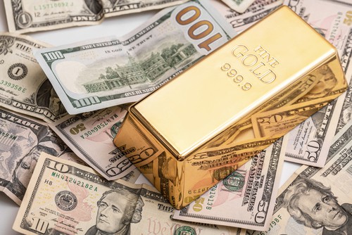 Expensive,Gold,Bar,And,Us,Dollar,Bills